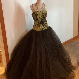 Green and black gown by flirt maggie sottero
